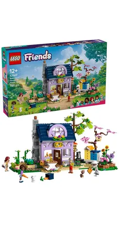 Конструктор LEGO Friends Будиночок і квітник бджолярів фото